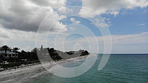 Florida clear blue water birds eye view - Floridian sandy beaches drone. city Ã¢â¬â¹Ã¢â¬â¹on the beach Aerial view of Indian Rocks Beach photo